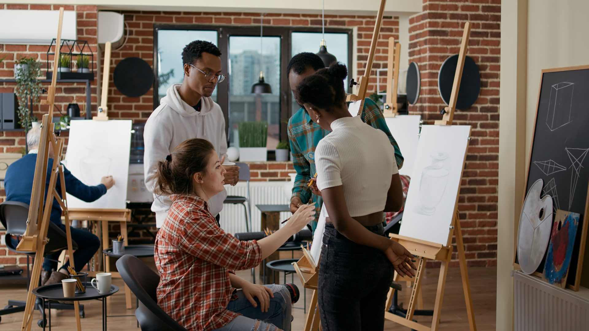 people drawing together